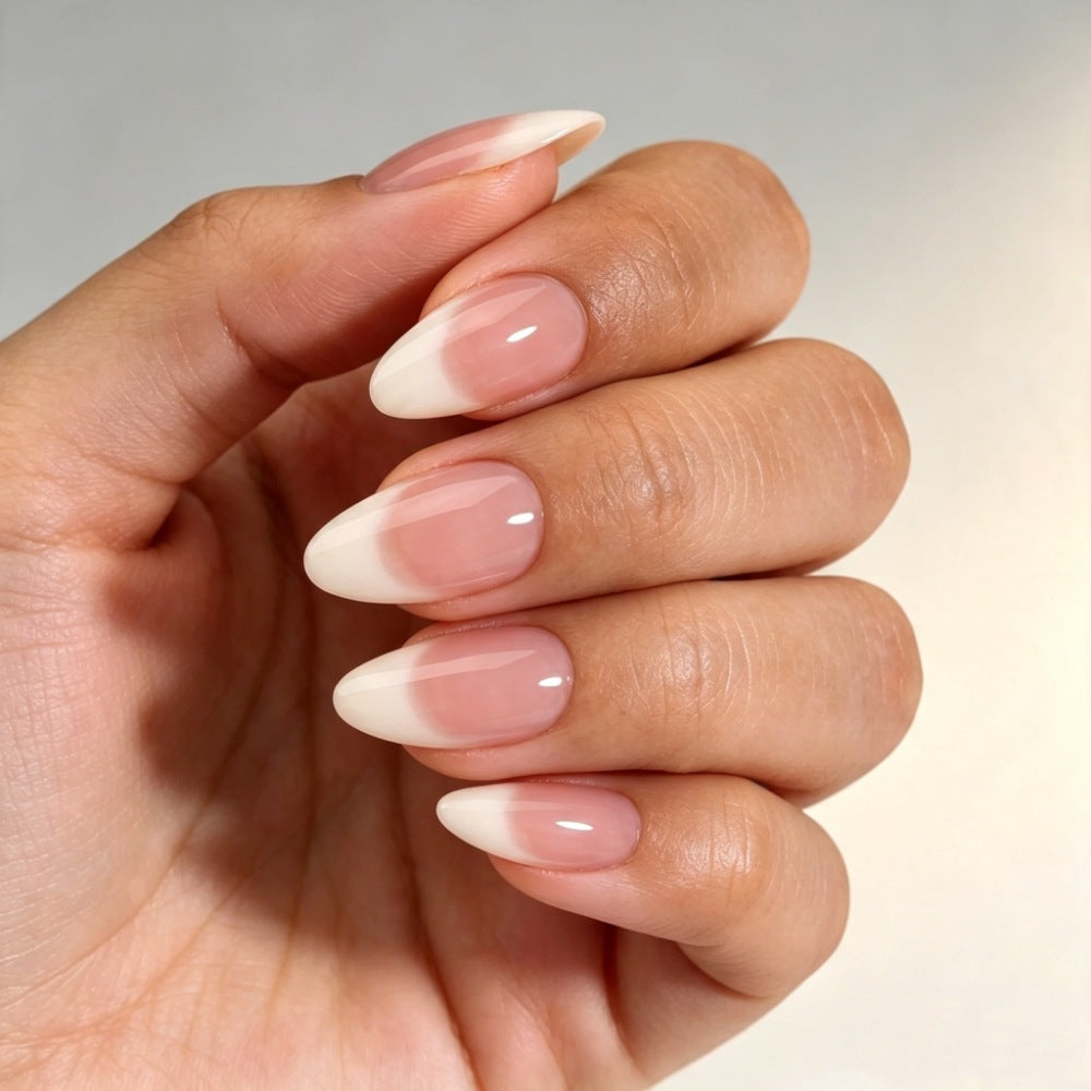 Artificial nails in elegant French-tip design Bowlift