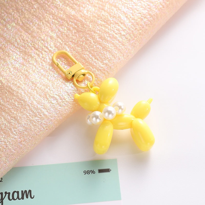 Playful keychain with balloon dog and beads Bowlift