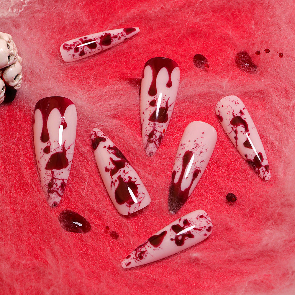 Artificial long stiletto nails with blood design Bowlift