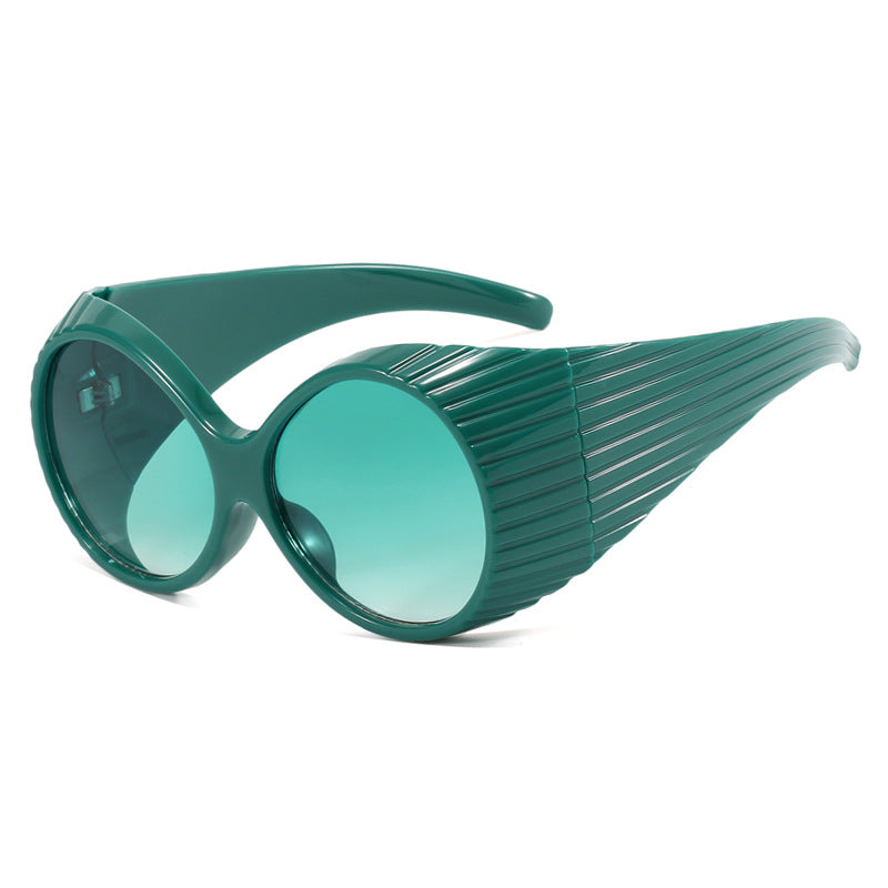 Women's extravagant sunglasses with curved frame Bowlift