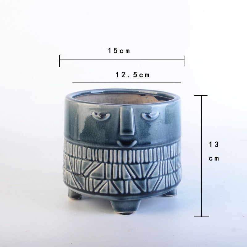 Decorative plant pot with facial features Bowlift