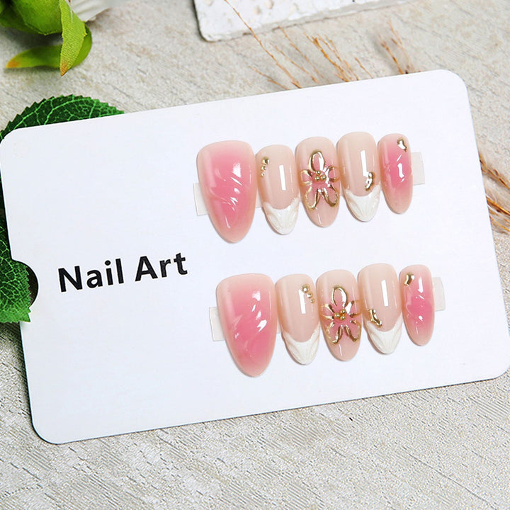 Artificial nails with floral design and glamorous accents Bowlift