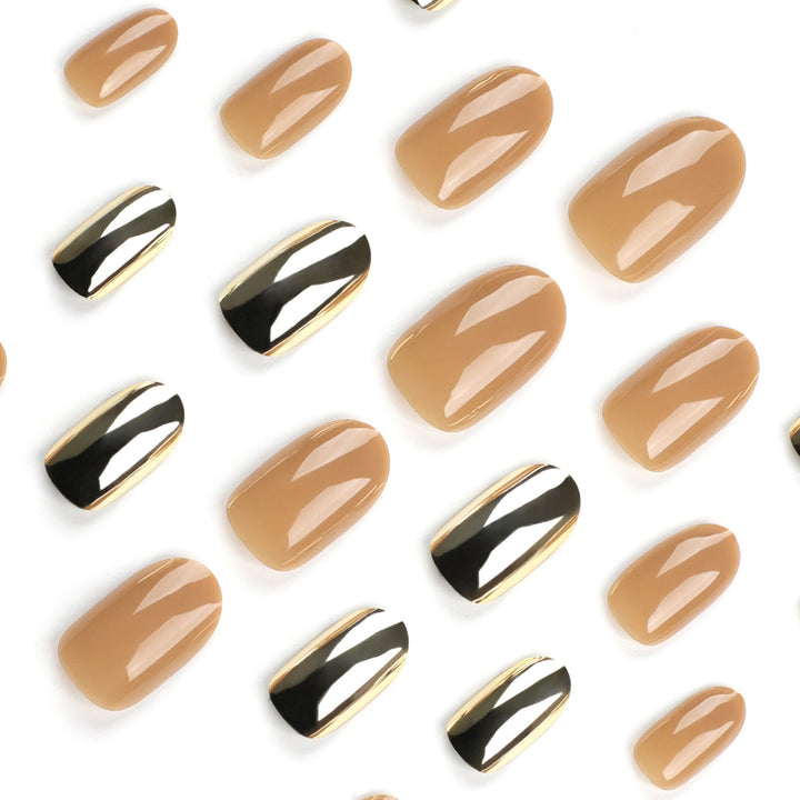 Luxurious artificial nails with metallic shiny accent Bowlift