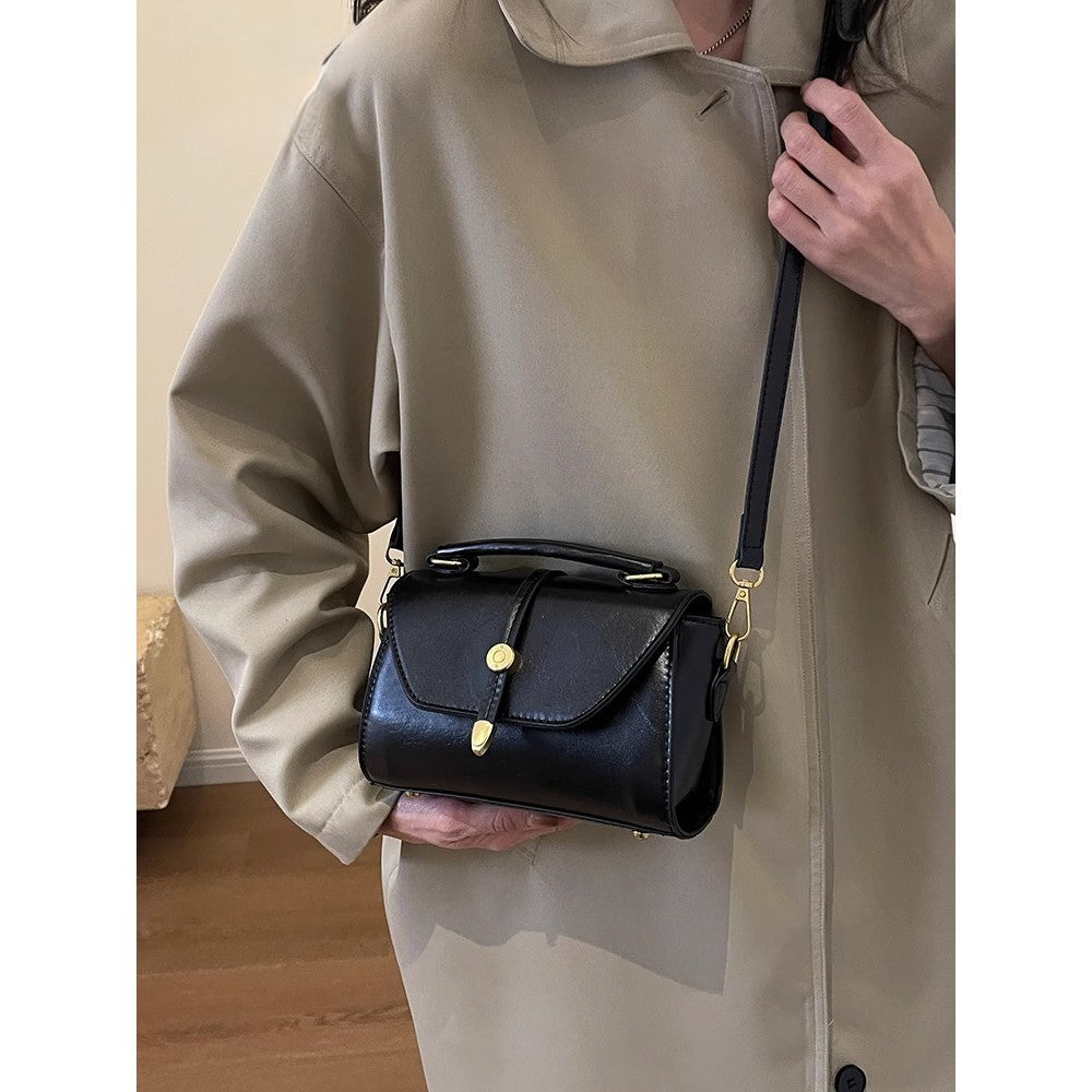 Vintage-Inspired Leather Handbag Bowlift