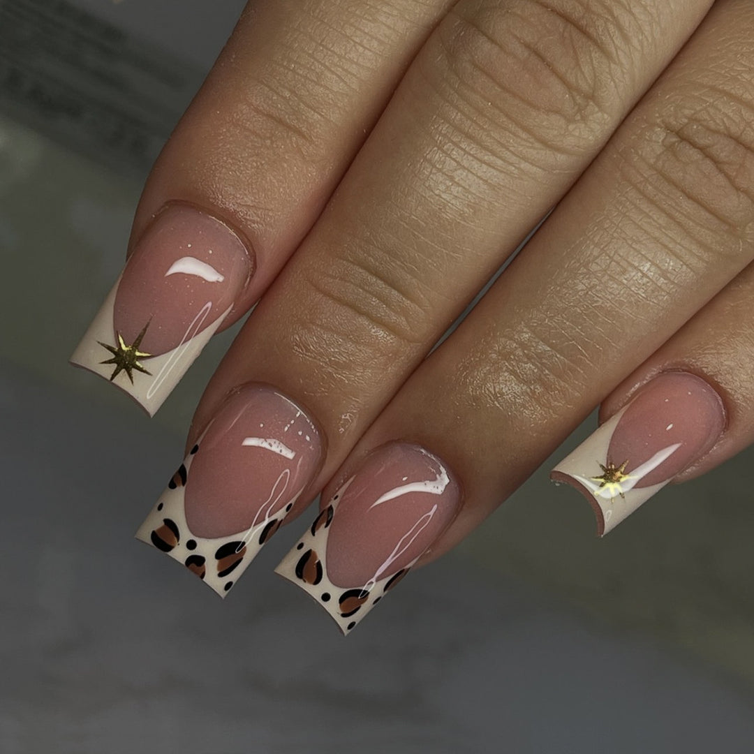 Creative nail art set with elegant leopard and glitter accents Bowlift