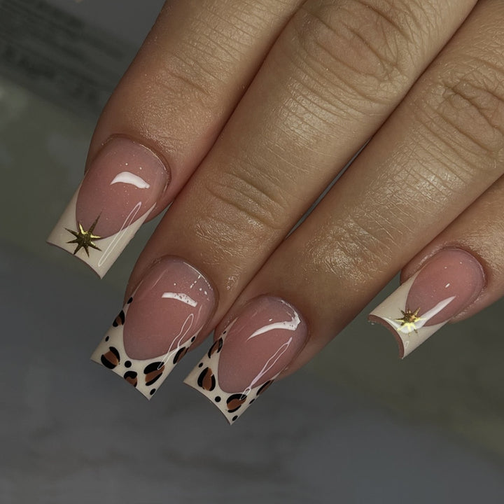 Creative nail art set with elegant leopard and glitter accents Bowlift