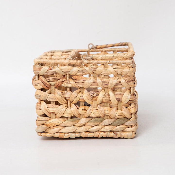 Handcrafted storage basket with embellished structure