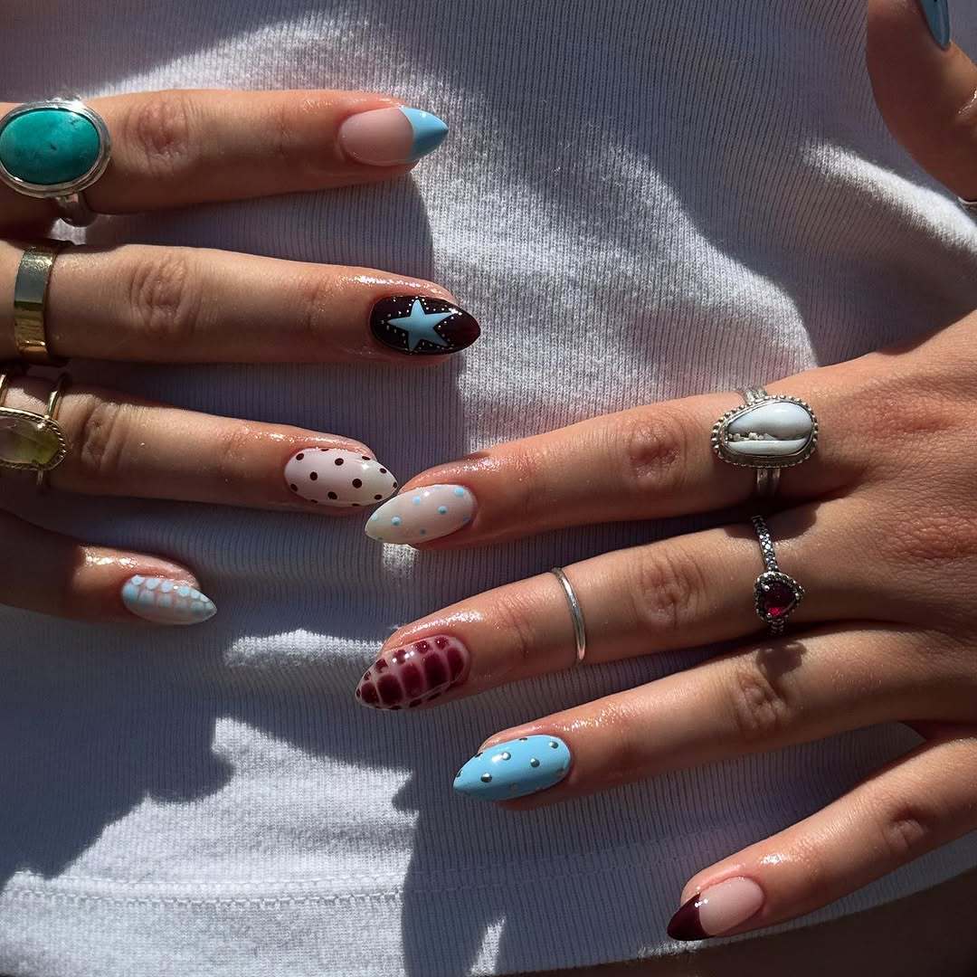Artificial nail set with creative patterns and playful accents Bowlift