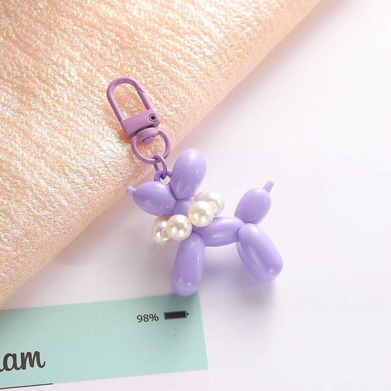 Playful keychain with balloon dog and beads Bowlift
