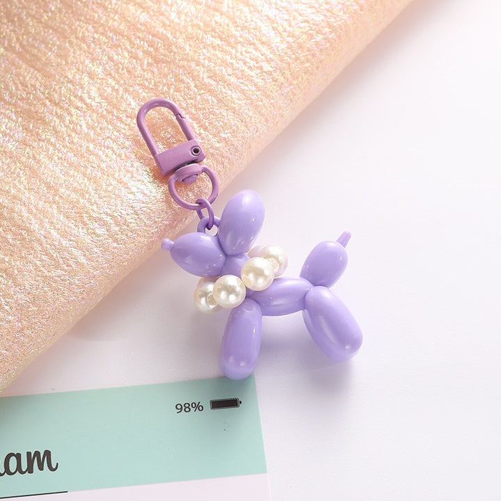 Playful keychain with balloon dog and beads Bowlift