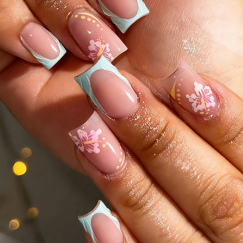 Artificial nails with floral design and glitter details Bowlift