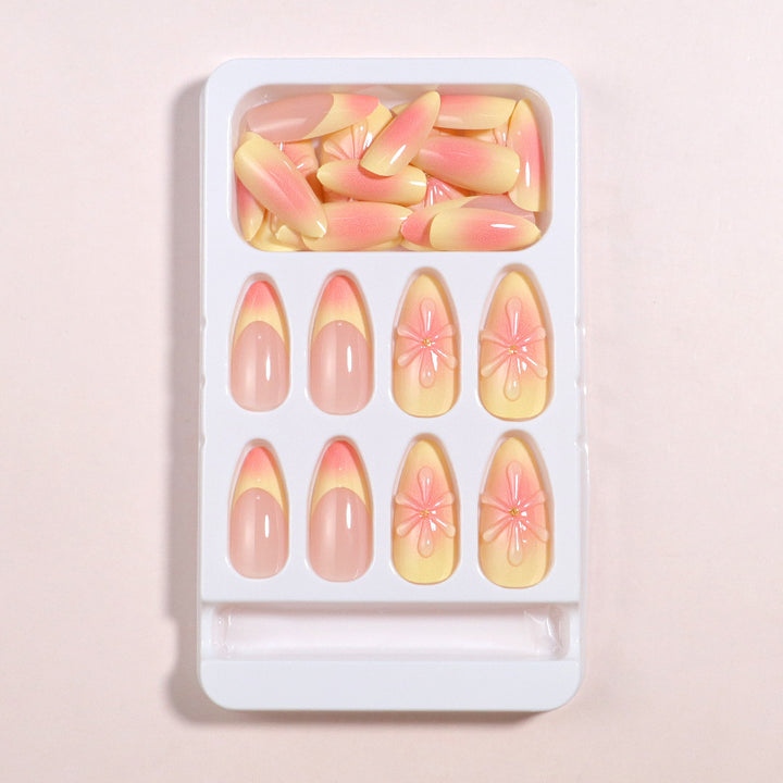 Artistic Press-On Nail Set with Floral Accents Bowlift
