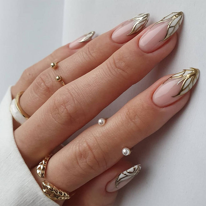 Artful stiletto nails with heart-shaped accents Bowlift