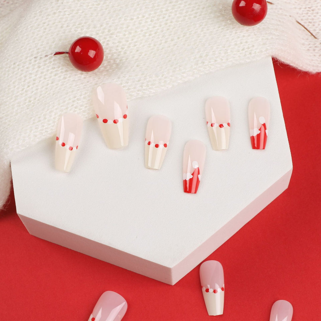 Artificial nail extensions with festive Christmas design Bowlift