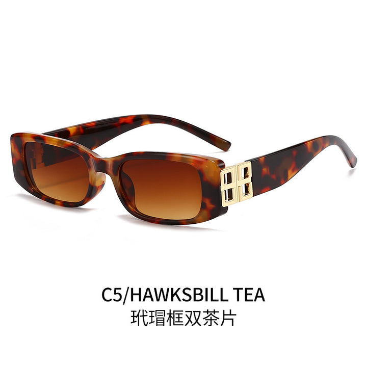 Ladies' fashionable sunglasses with luxurious gold-colored accent Bowlift