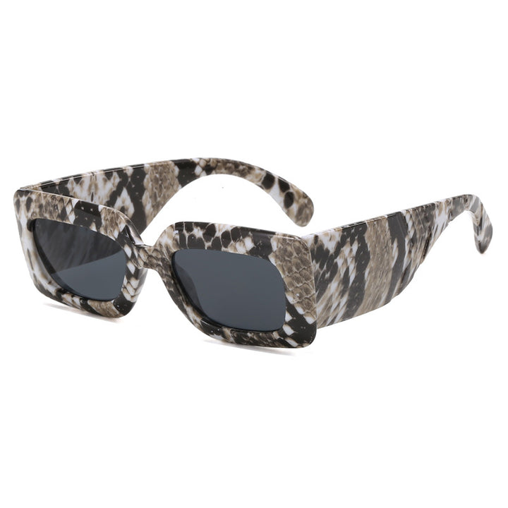 Women extravagant sunglasses with striking snake pattern Bowlift
