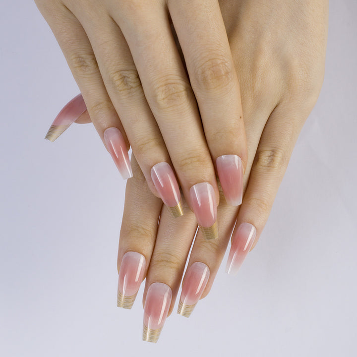 Shiny artificial nails with elegant gold rim Bowlift