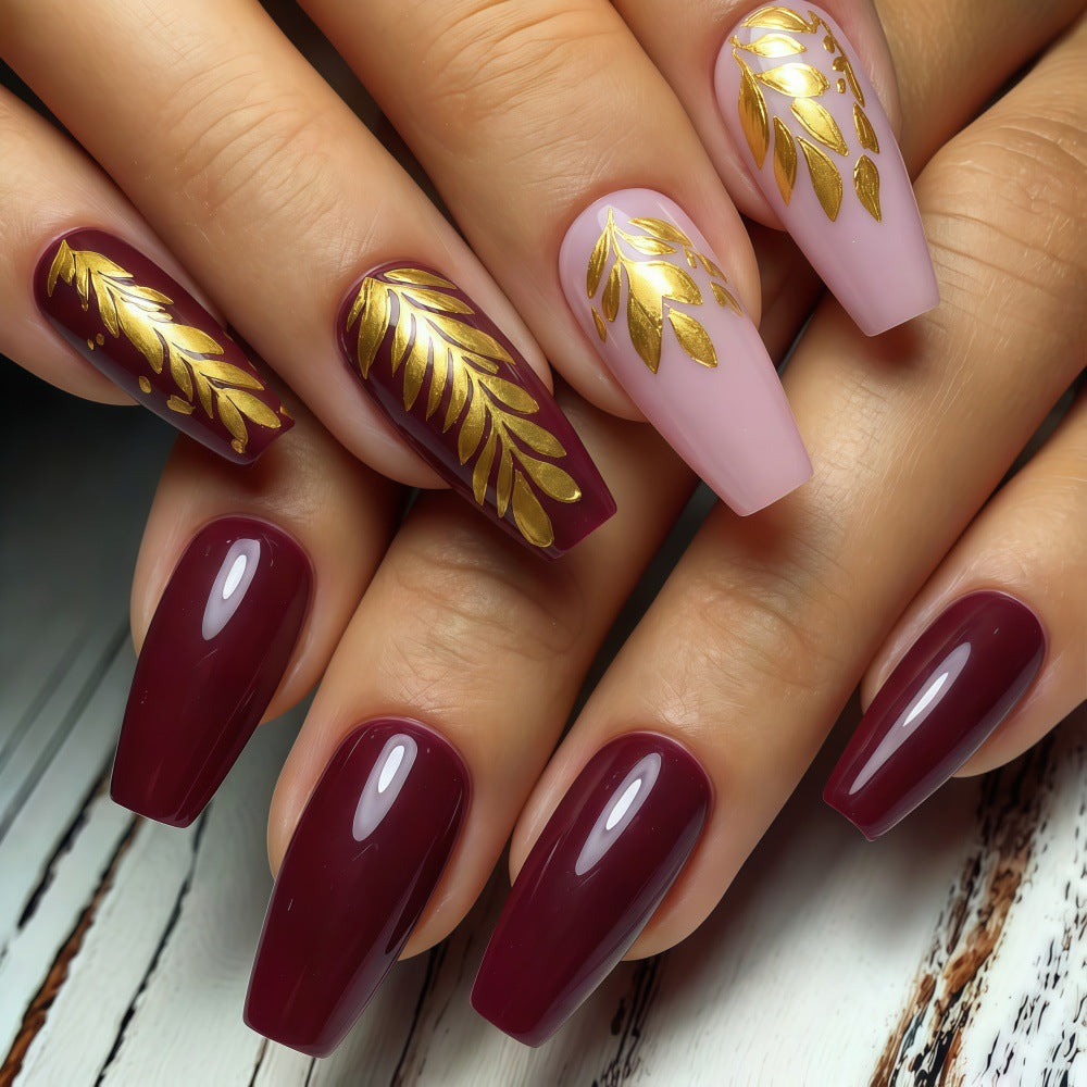 Elegant artificial nails with gold decoration Bowlift