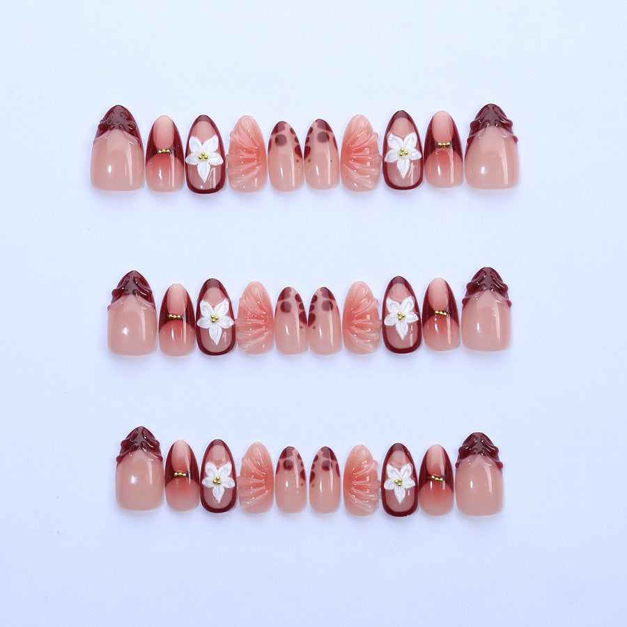 Artificial nail set with floral 3D applications and elegant gradient design Bowlift