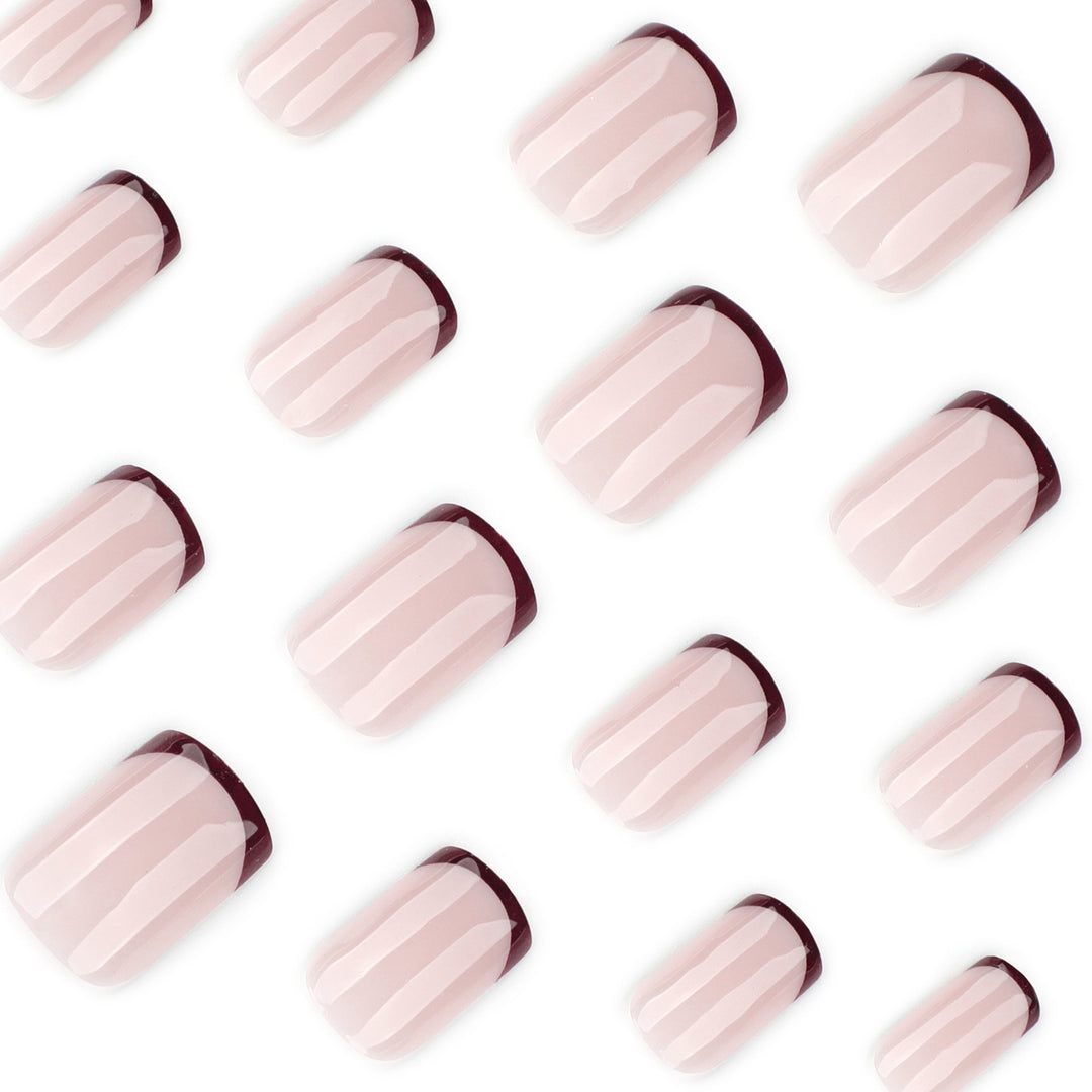Artful nail design with elegant French tip and glossy finish Bowlift