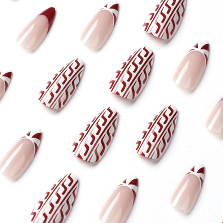 Elegant artificial nails in festive winter design Bowlift