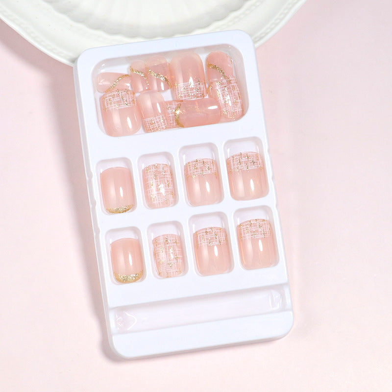 Elegant Press-On Nail Set with Gold Accent and Glitter Design Bowlift