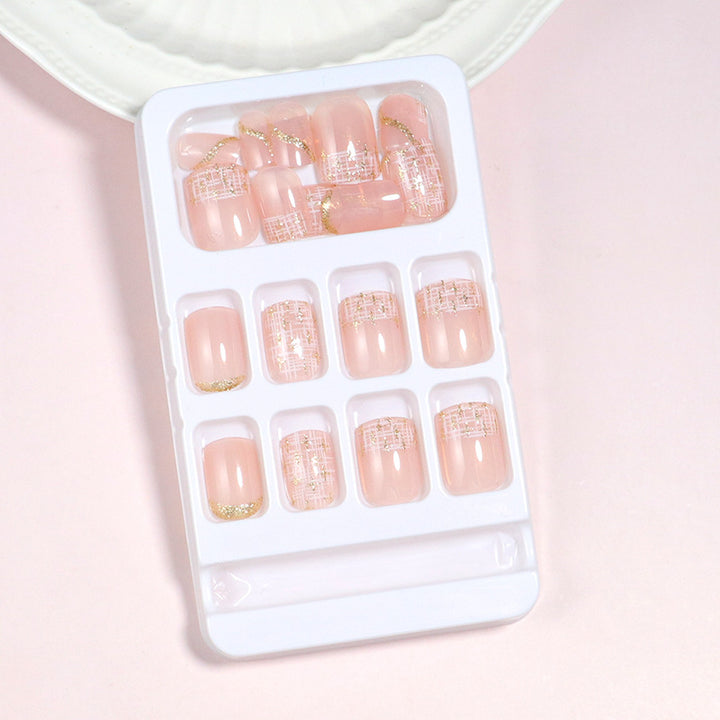 Elegant Press-On Nail Set with Gold Accent and Glitter Design Bowlift