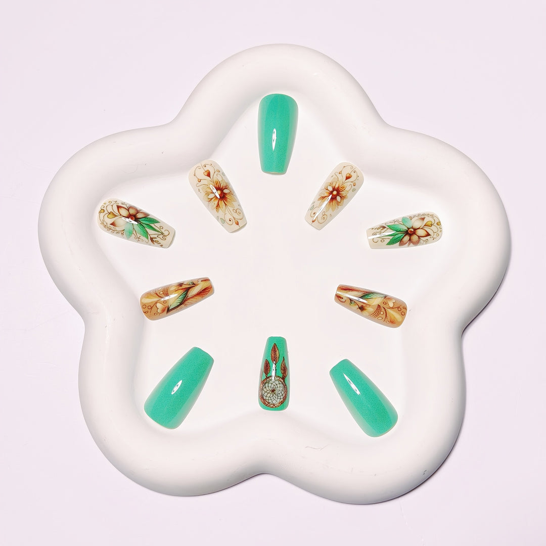 Creative artificial nails with floral and dreamcatcher design elements Bowlift