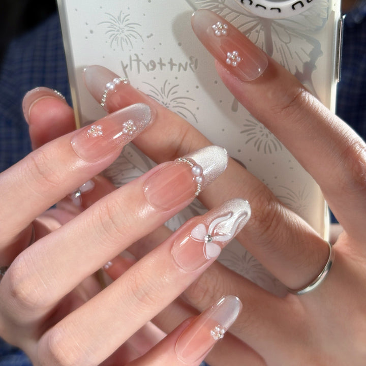 Decorative Long Stiletto Press-On Nails with Heart and Floral Accents Bowlift