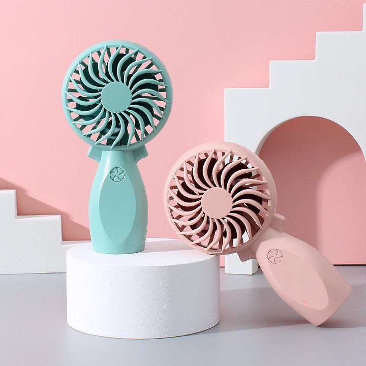 Women's portable hand fan with ergonomic grip and powerful battery technology Bowlift
