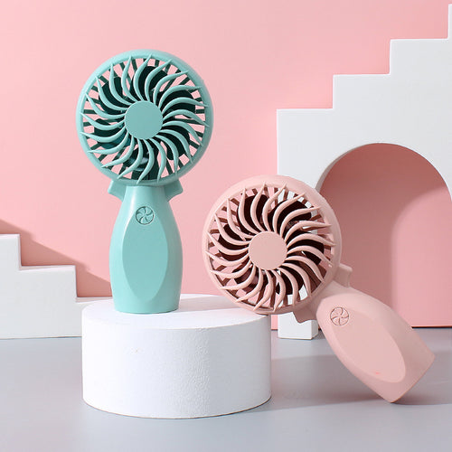 Women's portable hand fan with ergonomic grip and powerful battery technology Bowlift