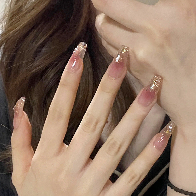 Artificial nails with glamorous glitter accents Bowlift