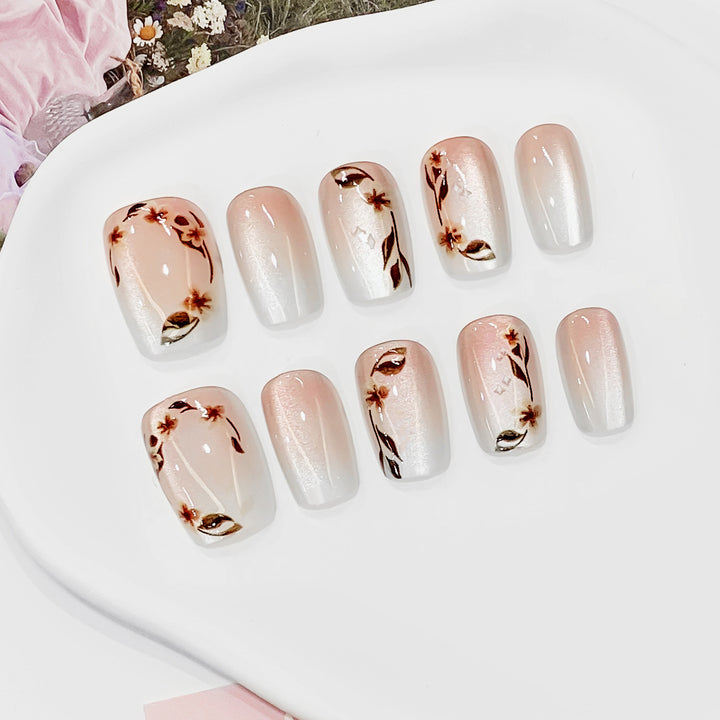 Artistic nail tips with floral accents Bowlift