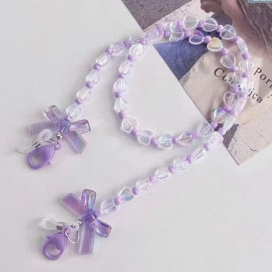 Fashionable glasses holder chain with heart and flower motifs Bowlift