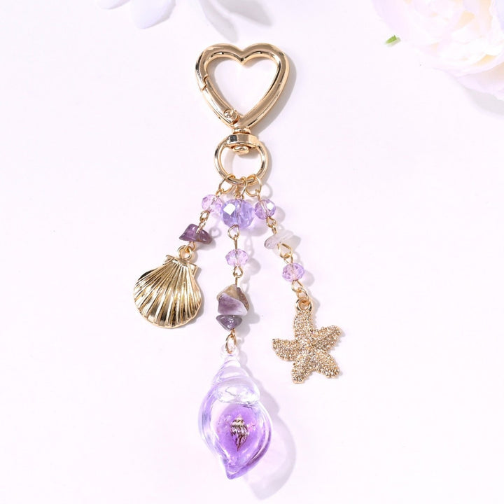 Keychain with Sparkling Sun Motif Bowlift