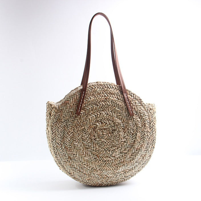 Braided straw beach bag with elegant leather handles Bowlift