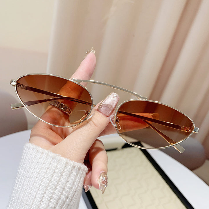 Ladies fashionable sunglasses in elegant oval design Bowlift