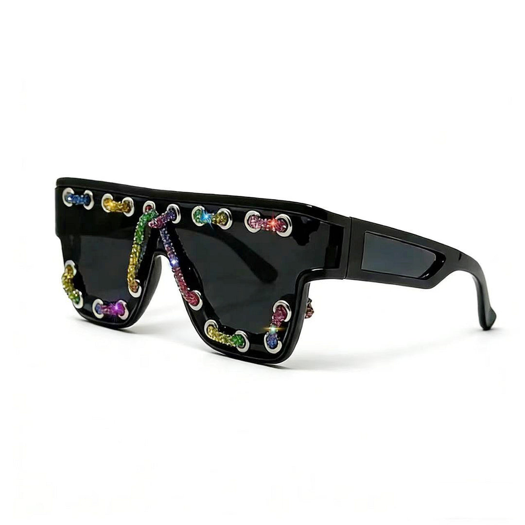Ladies sunglasses with extravagant design and decorative chain embellishment Bowlift