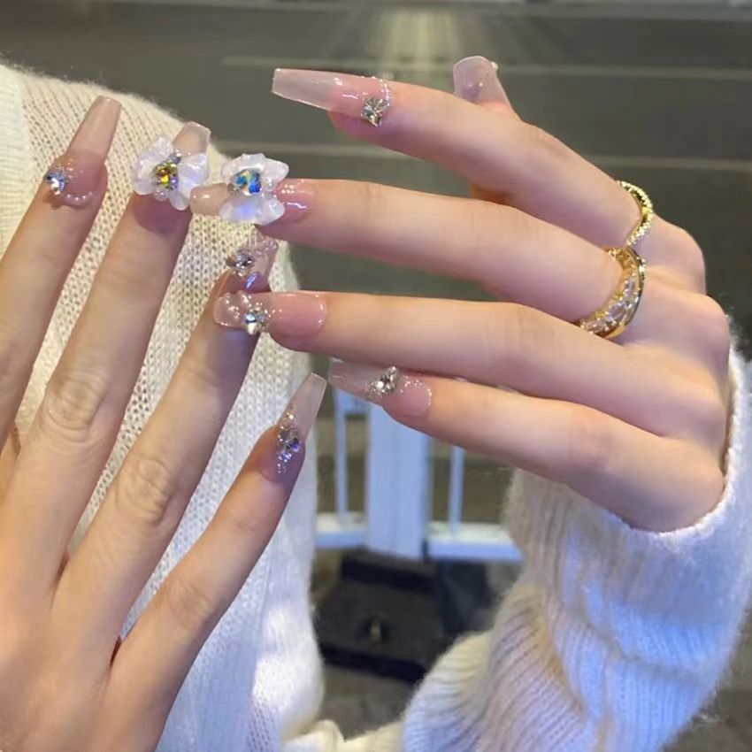 Elegant artificial nails with floral decor and glitter Bowlift