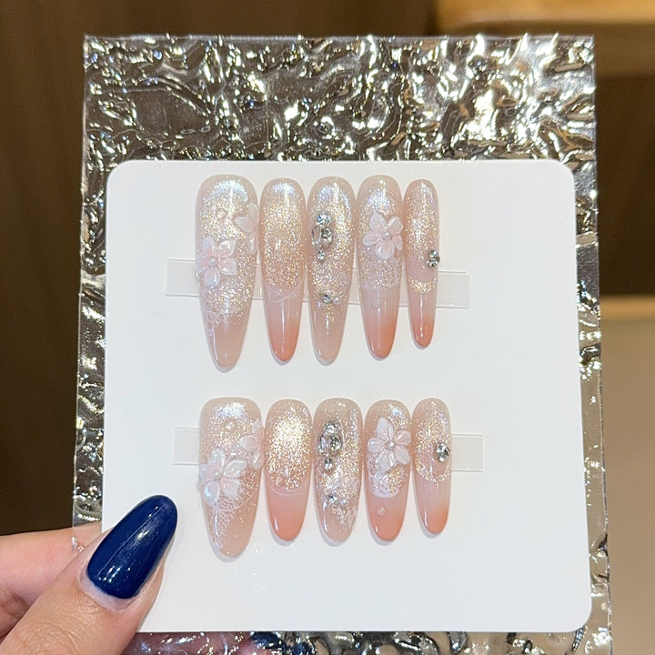 Artificial nails with floral design and glitter Bowlift