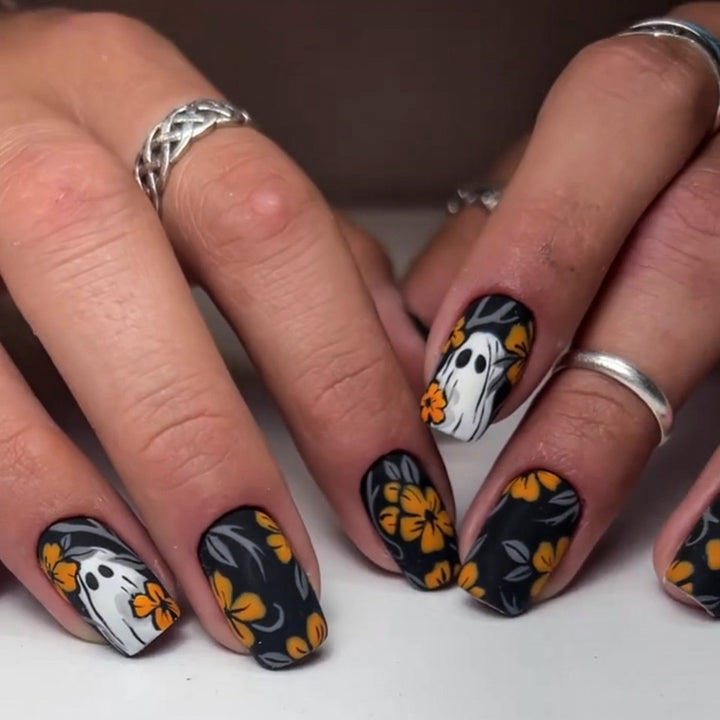 Acrylic nail set with spooky ghost design and floral accents Bowlift