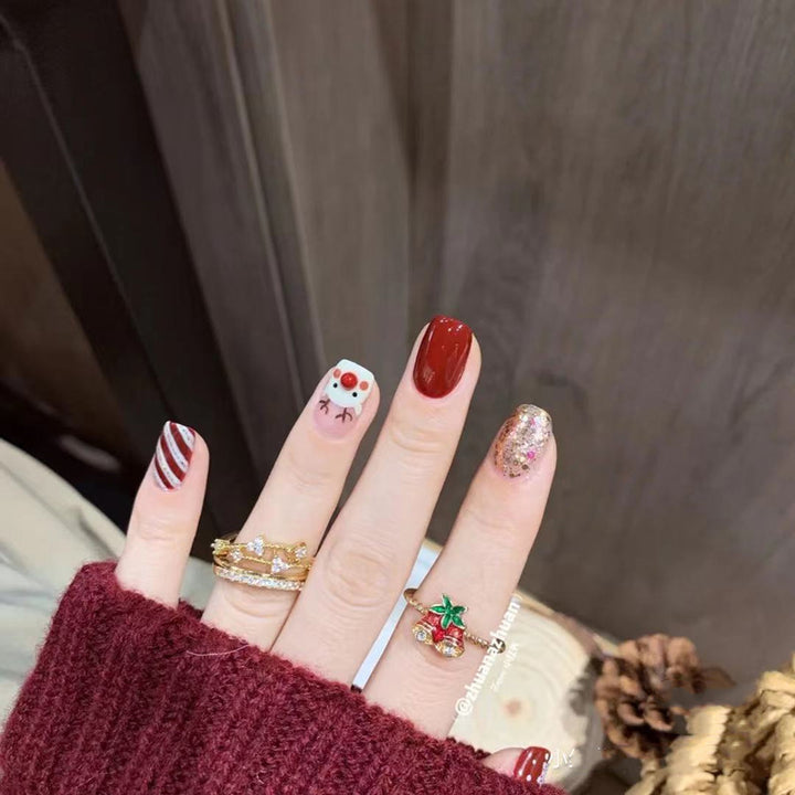 Artificial nail design with festive Christmas motif Bowlift