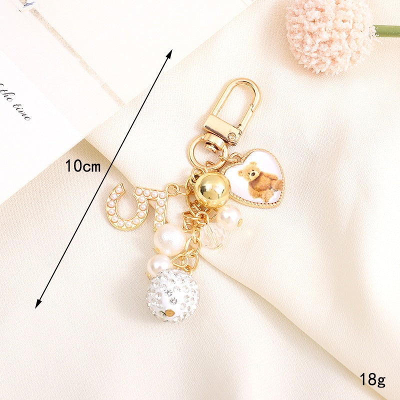 Playful keychain with teddy bear motif Bowlift