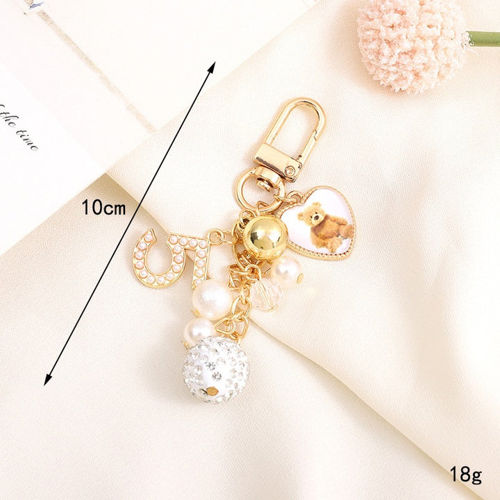 Playful keychain with teddy bear motif Bowlift