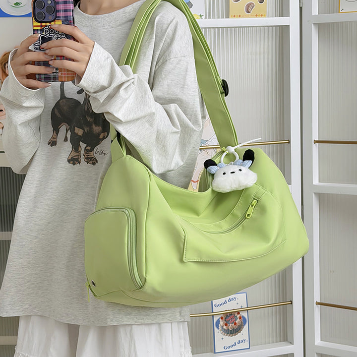Sporty shoulder bag with spacious interior and sturdy carrying strap Bowlift