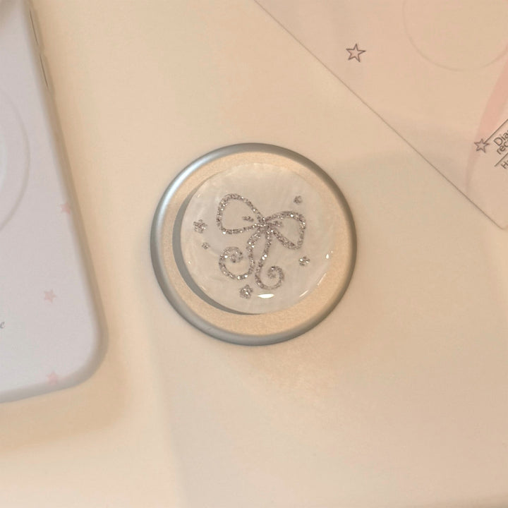 Stylish smartphone finger holder with glitter bow design Bowlift