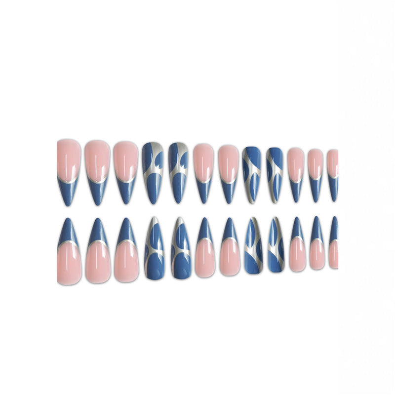 Artistic Stiletto Press-On Nail Design with Metallic Trim Bowlift