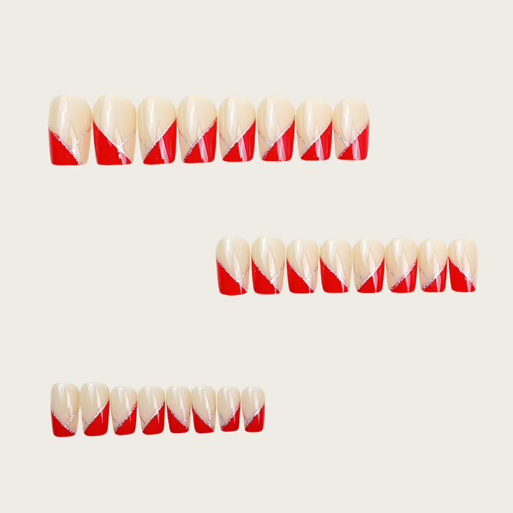 Artificial nails with luxurious gold and red accent design Bowlift