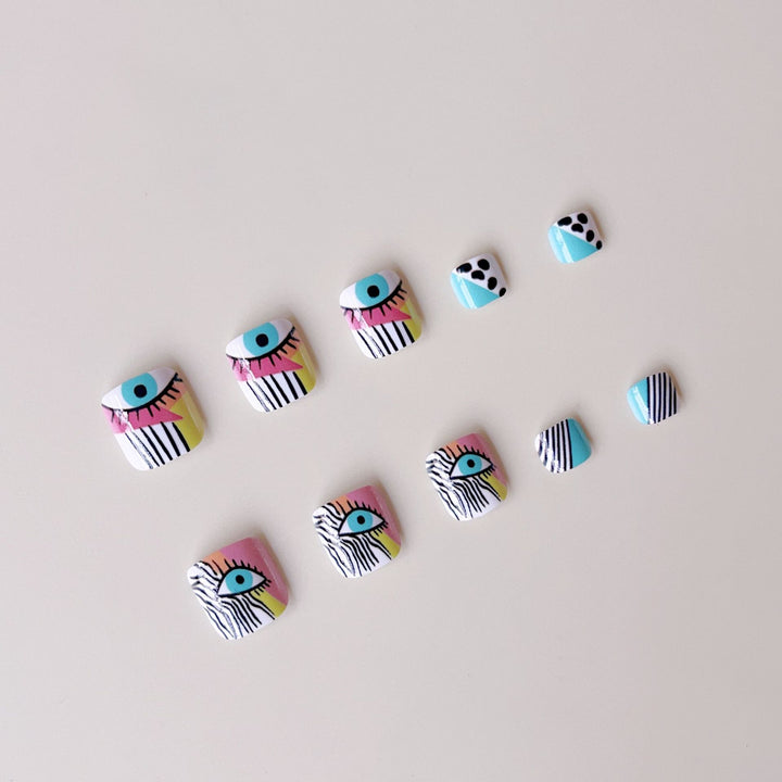 Artificial nail set with vibrant color accents and geometric patterns Bowlift