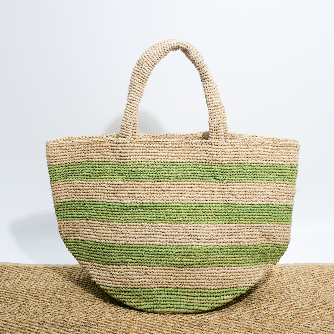 Handwoven beach bag in modern striped pattern Bowlift